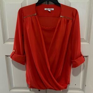 Avette medium orange blouse.